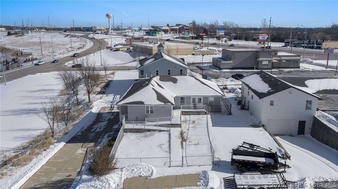 0.37 Acres of Mixed-Use Land for Sale in Osage Beach, Missouri