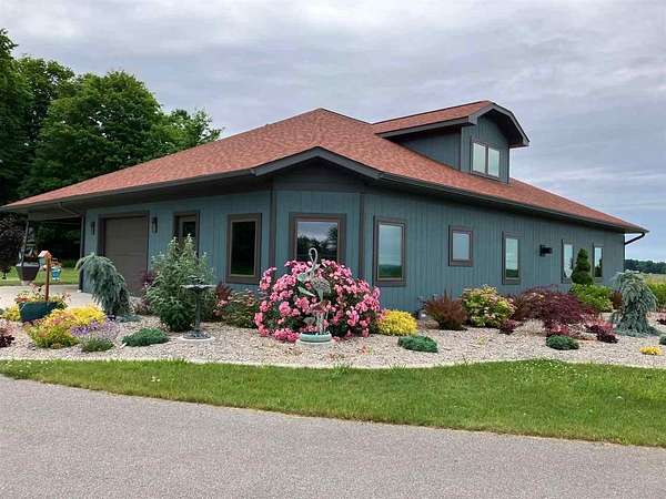 10 Acres of Land with Home for Sale in Charlevoix, Michigan