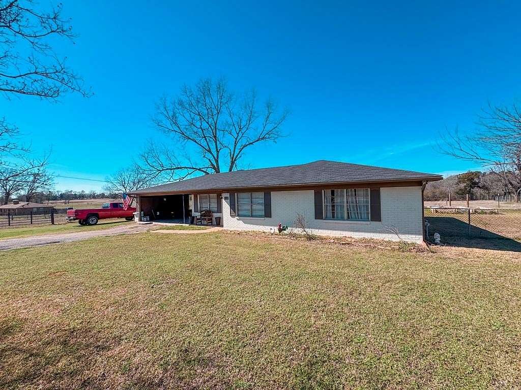 2.13 Acres of Land with Home for Sale in Elkhart, Texas