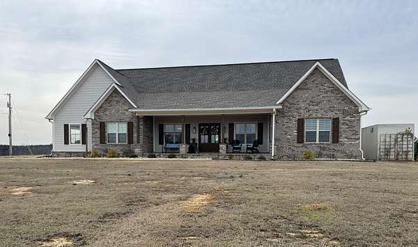4 Acres of Land with Home for Sale in Mantachie, Mississippi