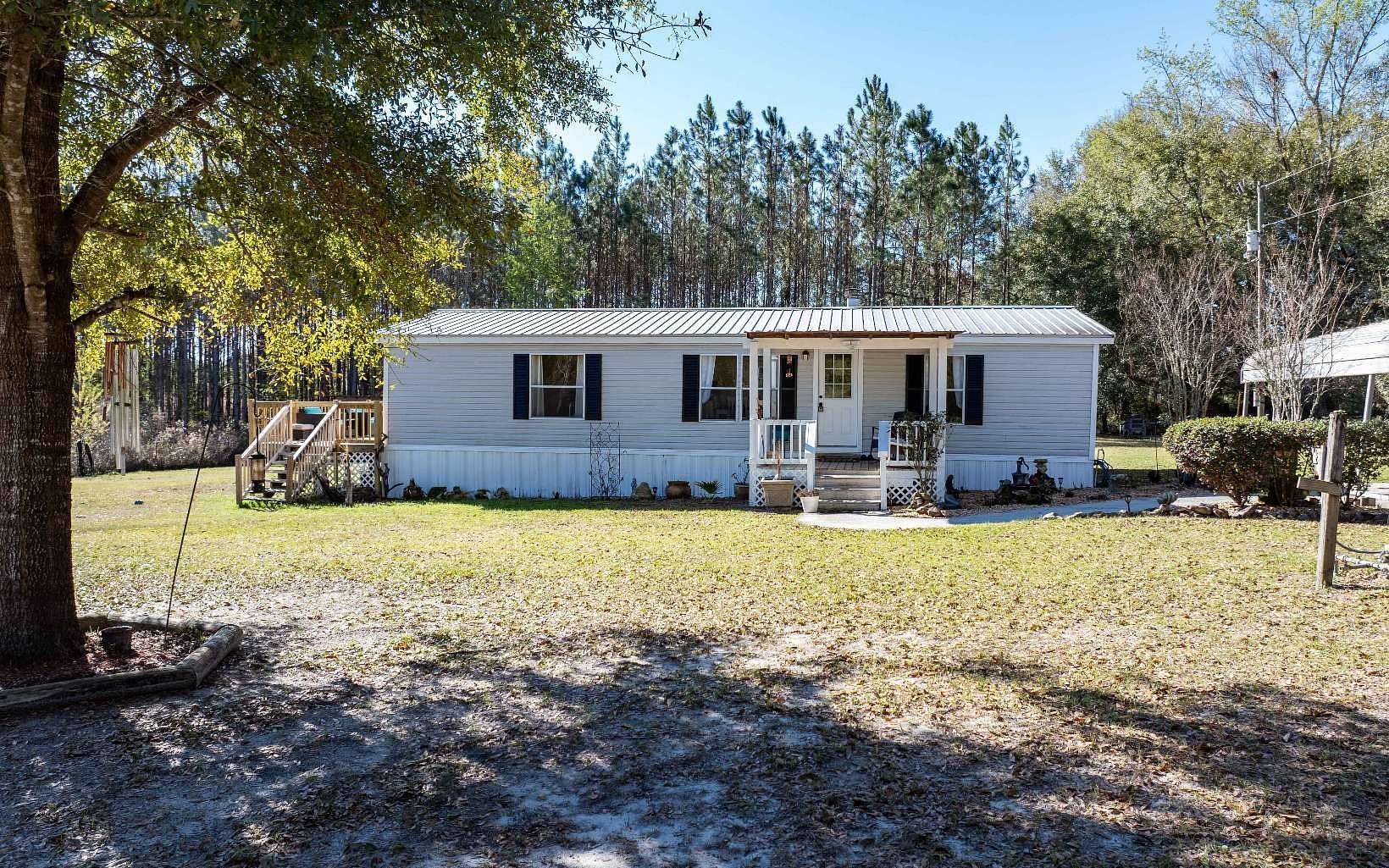 4.88 Acres of Land with Home for Sale in Lake City, Florida