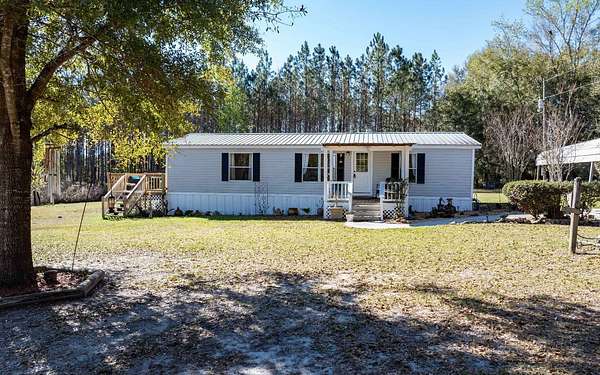 4.88 Acres of Land with Home for Sale in Lake City, Florida