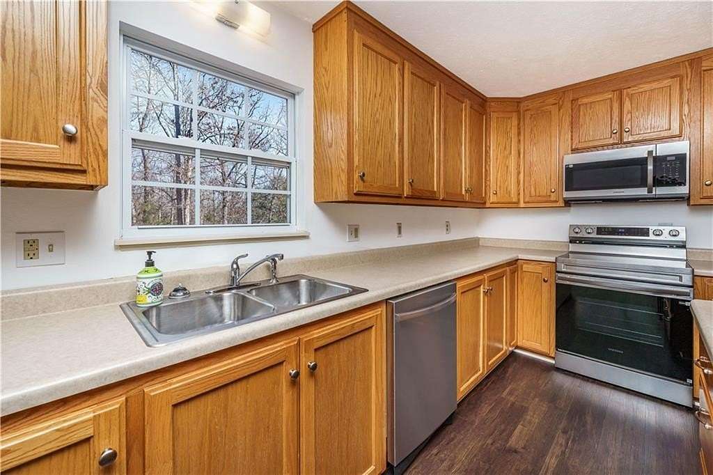 6.53 Acres of Land with Home for Sale in Green Forest, Arkansas