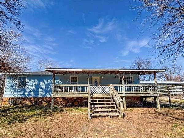 5 Acres of Land with Home for Sale in Tahlequah, Oklahoma