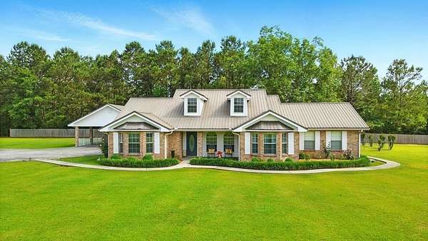 7.28 Acres of Land with Home for Sale in Picayune, Mississippi