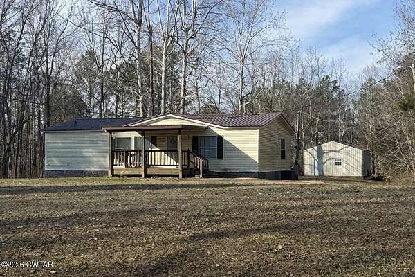 27.8 Acres of Land with Home for Sale in Wildersville, Tennessee