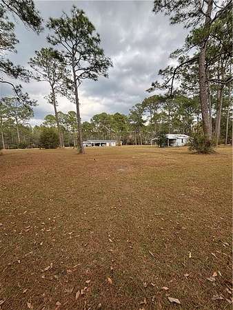 2.72 Acres of Land with Home for Sale in Coden, Alabama