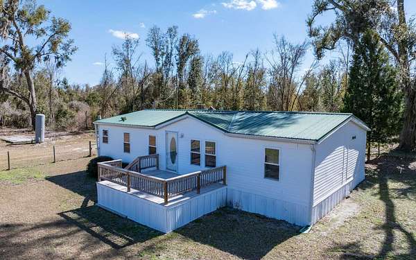 5 Acres of Land with Home for Sale in Live Oak, Florida