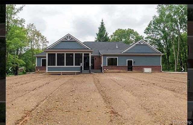 2.4 Acres of Land with Home for Sale in Highland Township, Michigan