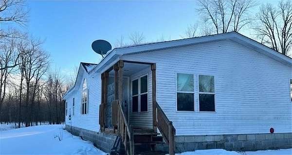 9.86 Acres of Land with Home for Sale in Dell Grove Township, Minnesota