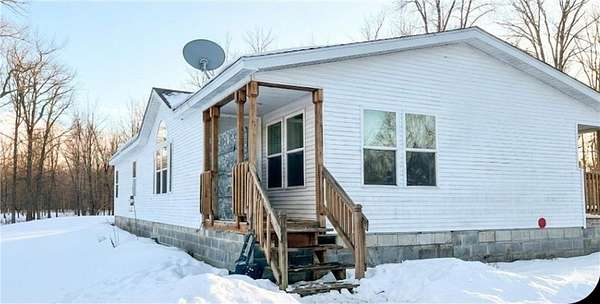 9.86 Acres of Land with Home for Sale in Dell Grove Township, Minnesota