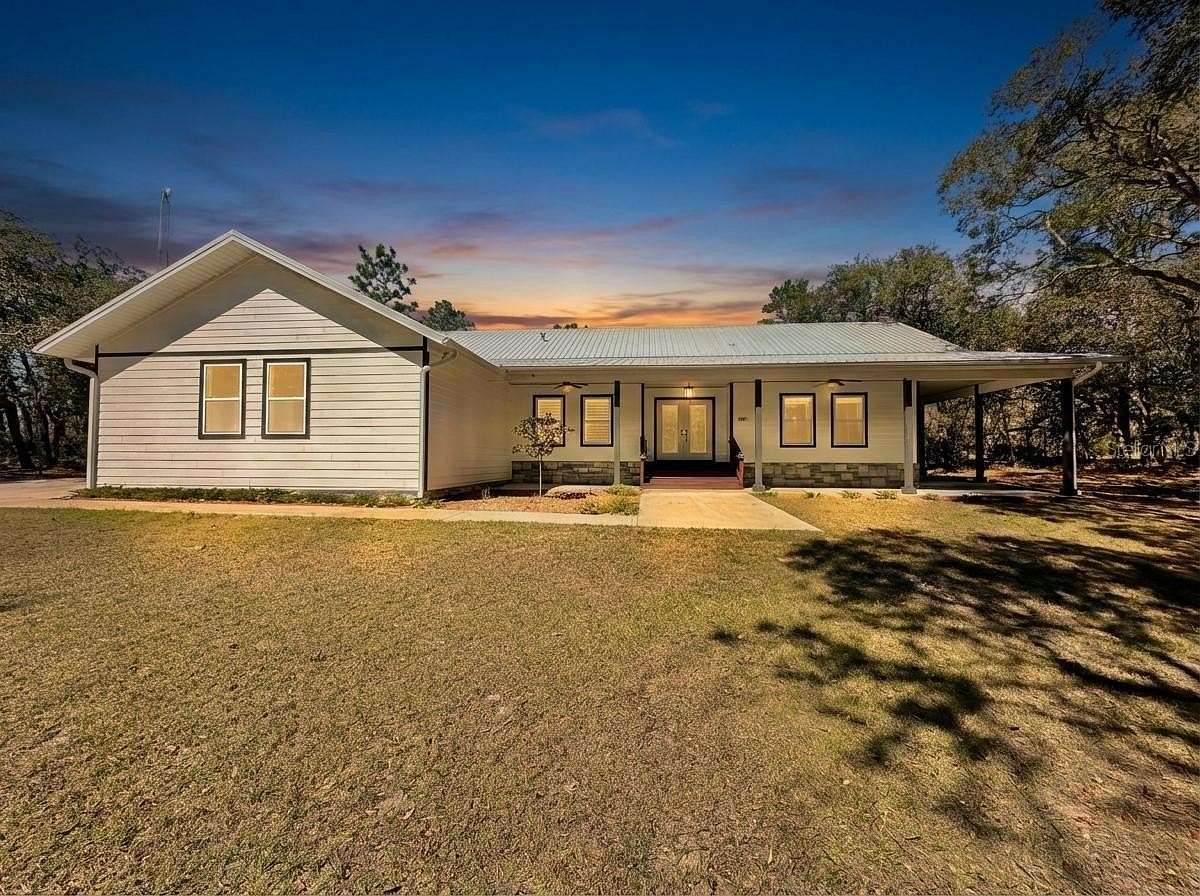 5.24 Acres of Land with Home for Sale in Morriston, Florida