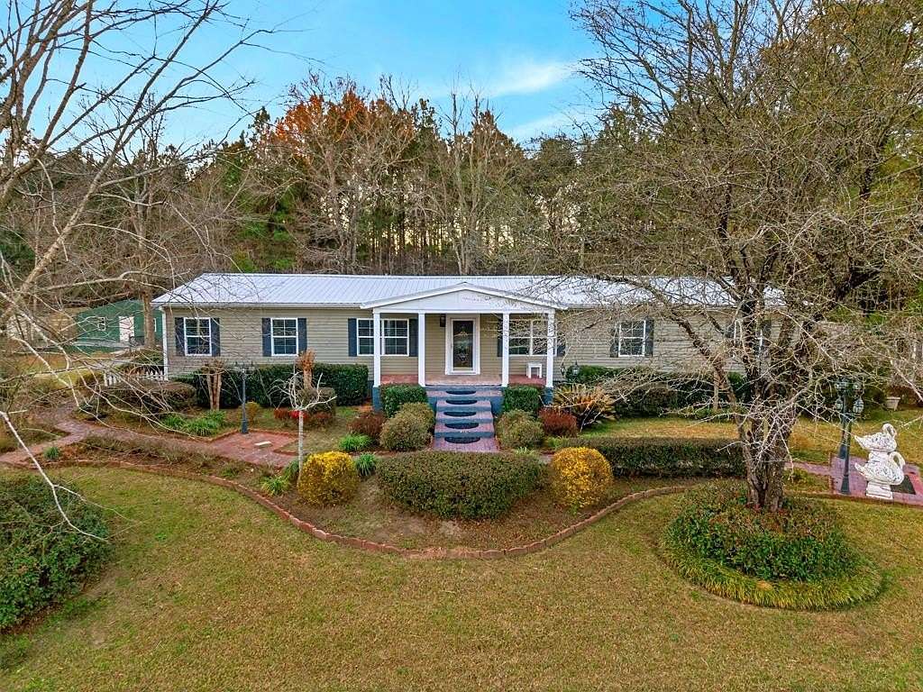 8.48 Acres of Land with Home for Sale in Poplarville, Mississippi