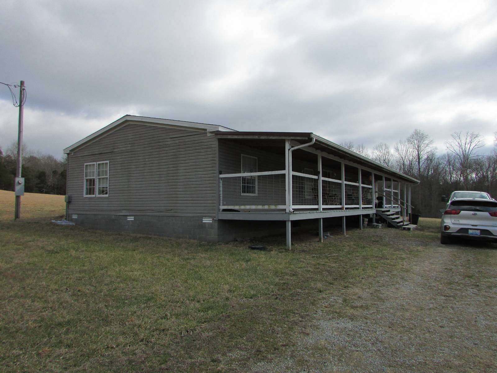 6.39 Acres of Land with Home for Sale in Columbia, Kentucky