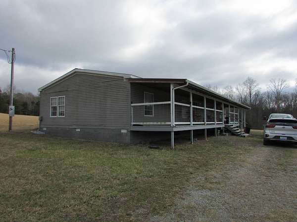 6.39 Acres of Land with Home for Sale in Columbia, Kentucky