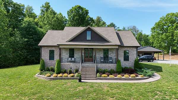 8.13 Acres of Land with Home for Sale in Cottontown, Tennessee