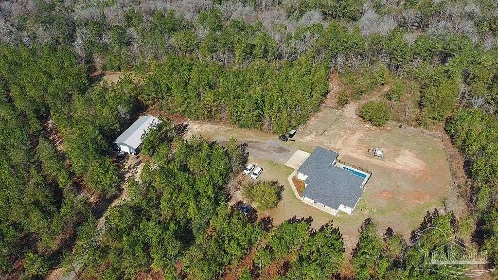 8 Acres of Land with Home for Sale in Jay, Florida