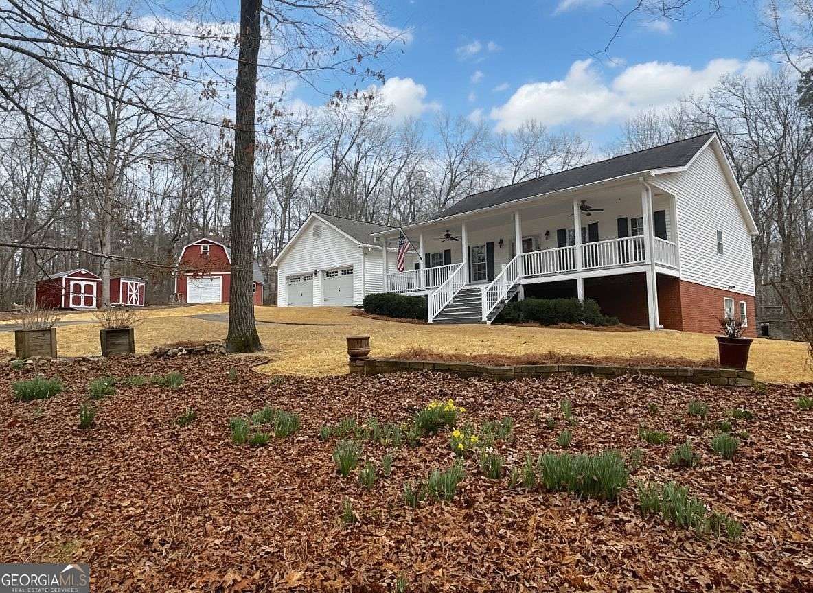 6.84 Acres of Land with Home for Sale in Douglasville, Georgia