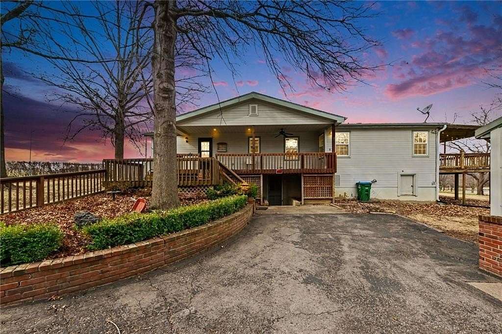 6.69 Acres of Land with Home for Sale in Lee's Summit, Missouri