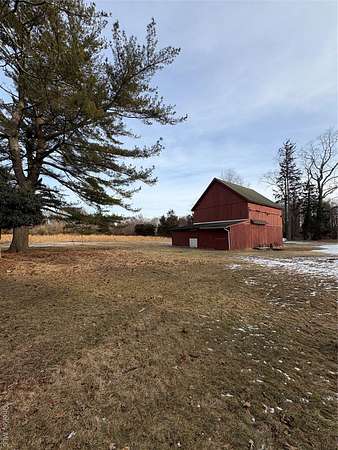 1.82 Acres of Land with Home for Sale in Middle Island, New York