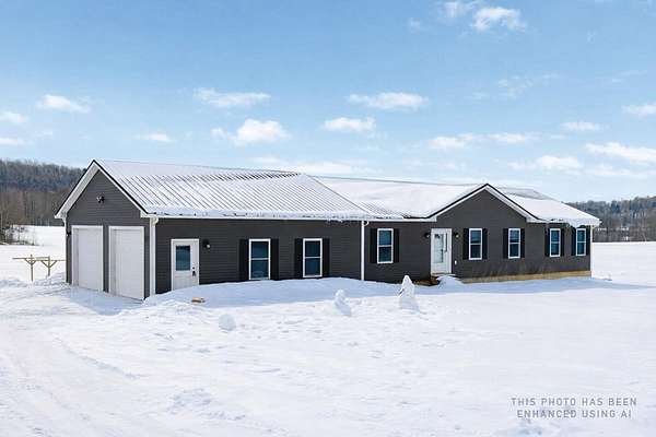 2.8 Acres of Land with Home for Sale in Franklin, Vermont