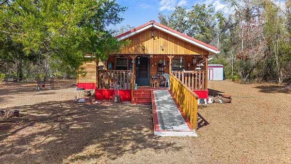 5.63 Acres of Land with Home for Sale in Old Town, Florida