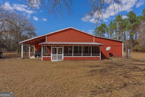 38 Acres of Recreational Land with Home for Sale in Saint George, Georgia