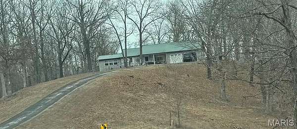 6.9 Acres of Land with Home for Sale in Dixon, Missouri