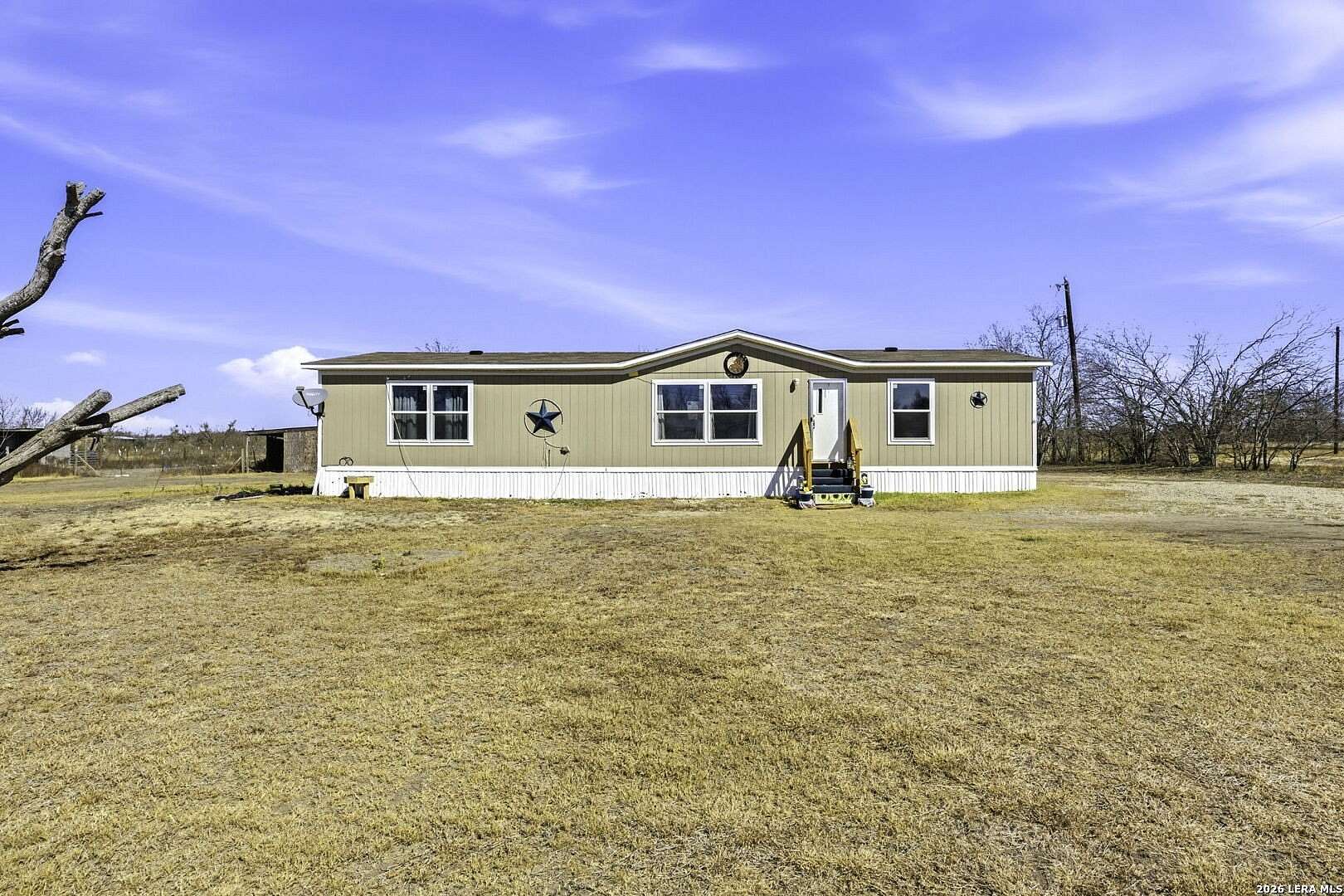 2.33 Acres of Land with Home for Sale in Devine, Texas
