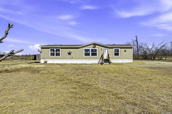 2.33 Acres of Land with Home for Sale in Devine, Texas