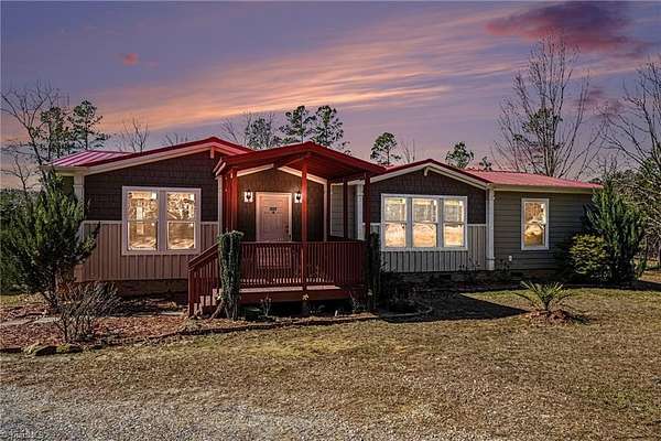 6.79 Acres of Land with Home for Sale in Troy, North Carolina