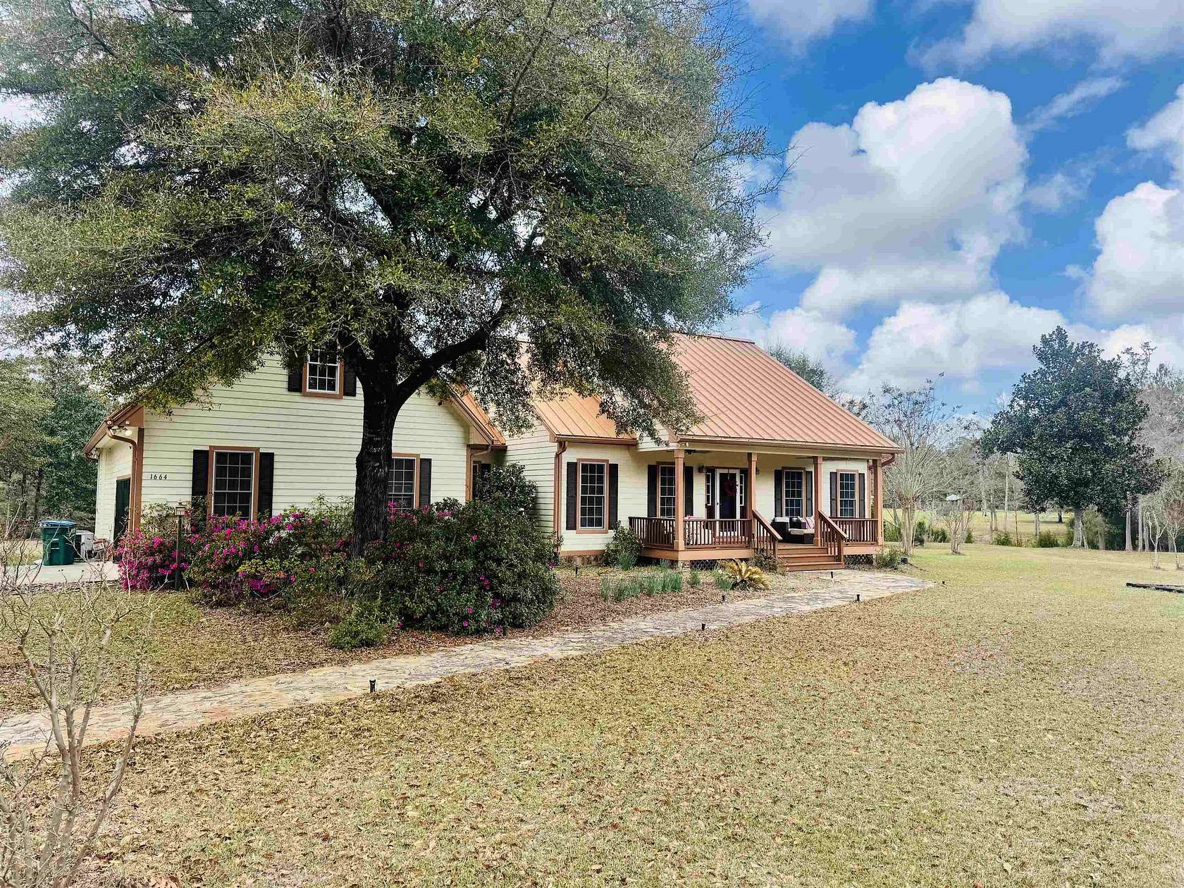 4.49 Acres of Land with Home for Sale in Sopchoppy, Florida