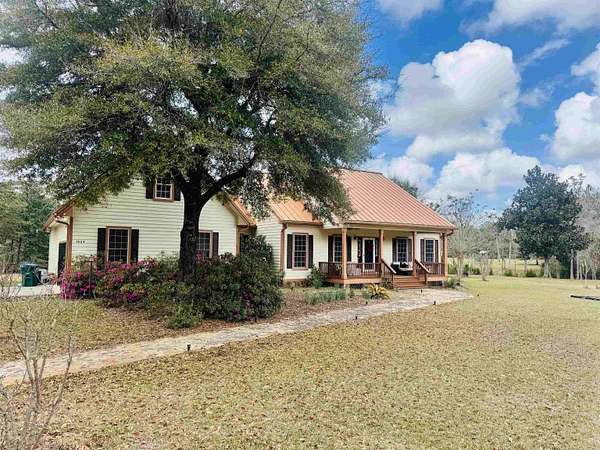 4.49 Acres of Land with Home for Sale in Sopchoppy, Florida