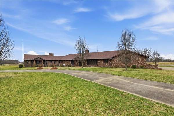 13.9 Acres of Land with Home for Sale in Pittsburg, Kansas