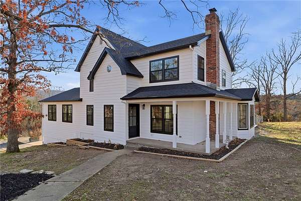 5.2 Acres of Land with Home for Sale in Eureka Springs, Arkansas