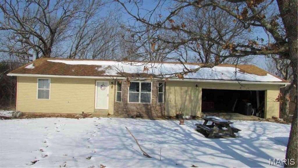 5.4 Acres of Land with Home for Sale in De Soto, Missouri