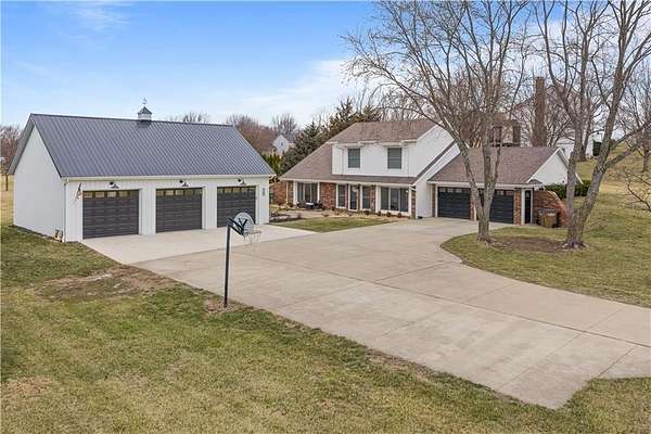 2.5 Acres of Land with Home for Sale in Raymore, Missouri