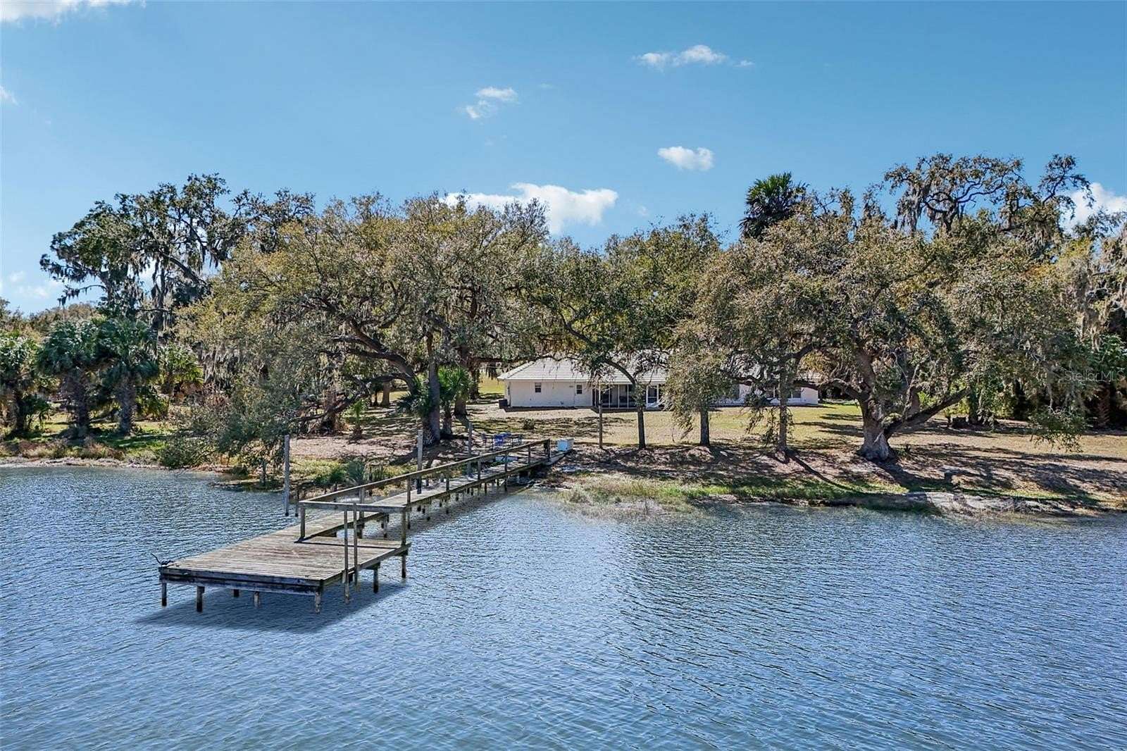 3.29 Acres of Land with Home for Sale in Grand Island, Florida