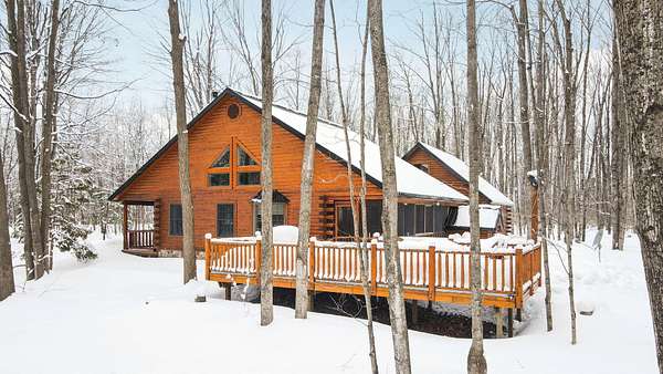 6 Acres of Land with Home for Sale in Elmira, Michigan