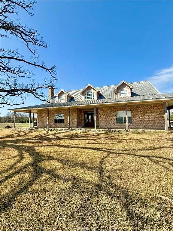 30 Acres of Land with Home for Sale in Madisonville, Texas