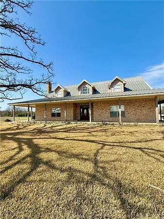 30 Acres of Land with Home for Sale in Madisonville, Texas