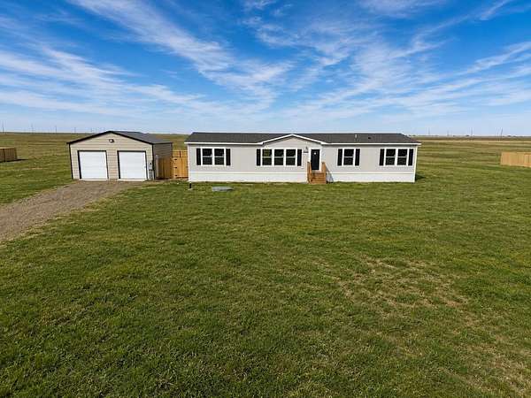 5 Acres of Land with Home for Sale in Canyon, Texas