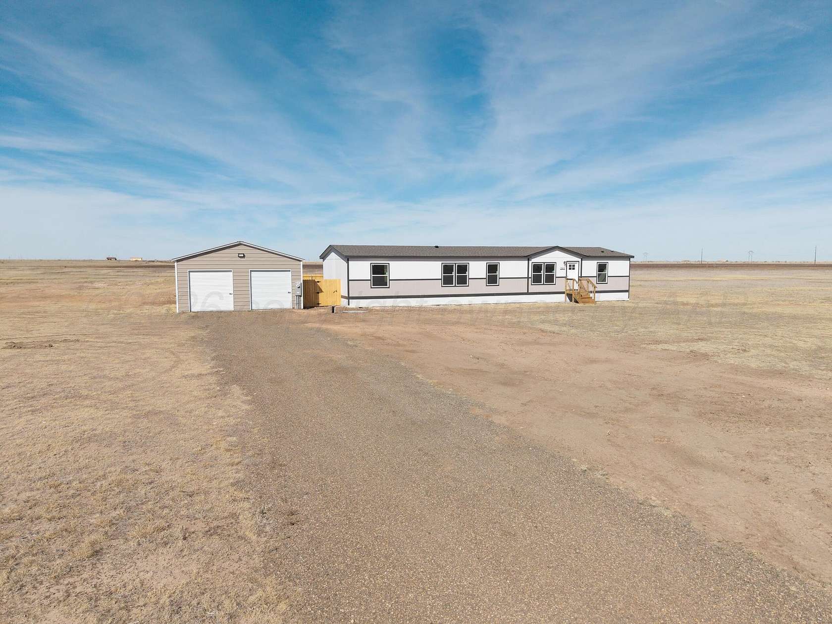 5 Acres of Land with Home for Sale in Canyon, Texas