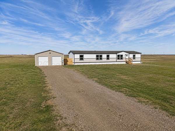 5 Acres of Land with Home for Sale in Canyon, Texas