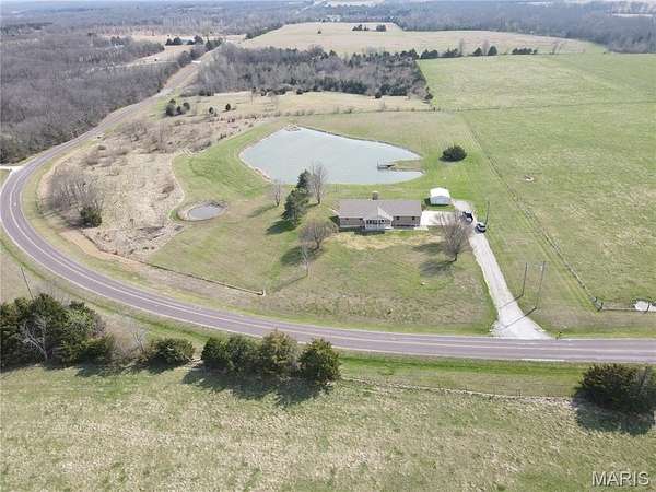 7.2 Acres of Land with Home for Sale in Monroe City, Missouri