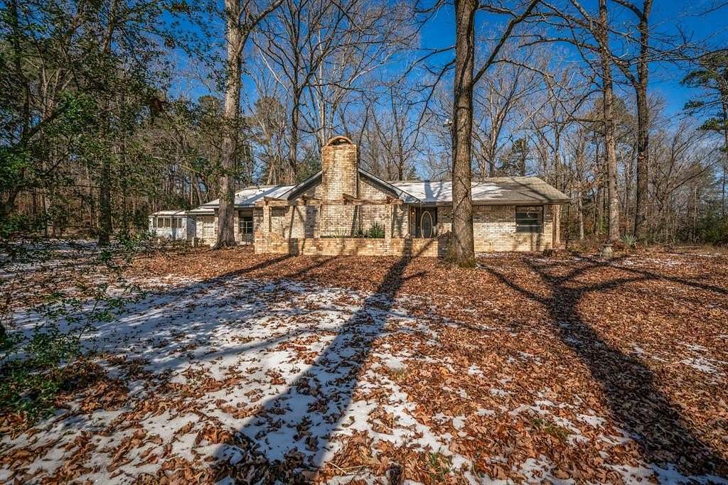 11.3 Acres of Recreational Land with Home for Sale in Hughes Springs, Texas