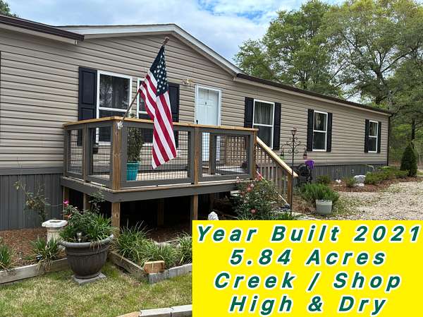 5.84 Acres of Land with Home for Sale in DeFuniak Springs, Florida