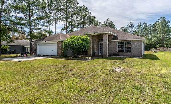 3.52 Acres of Land with Home for Auction in Bryceville, Florida