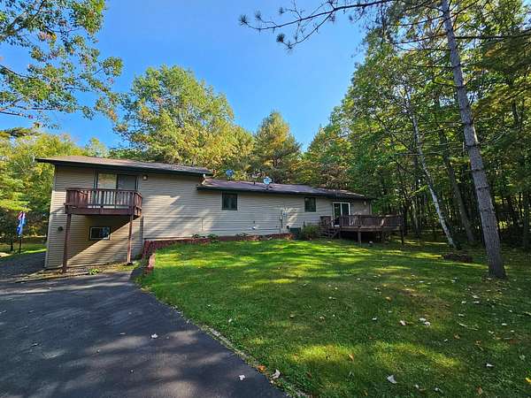 3.18 Acres of Land with Home for Sale in Lake Tomahawk, Wisconsin