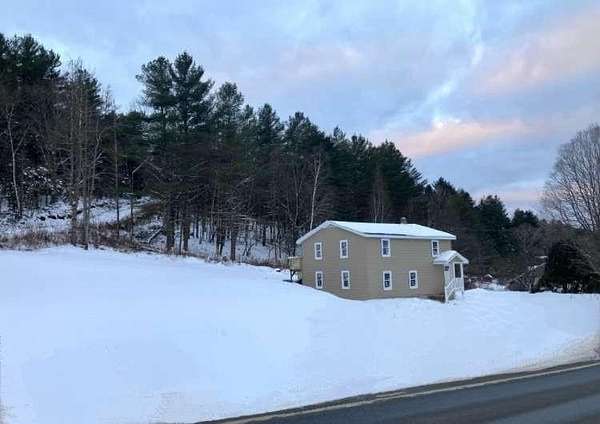 8 Acres of Land with Home for Sale in Mount Holly, Vermont